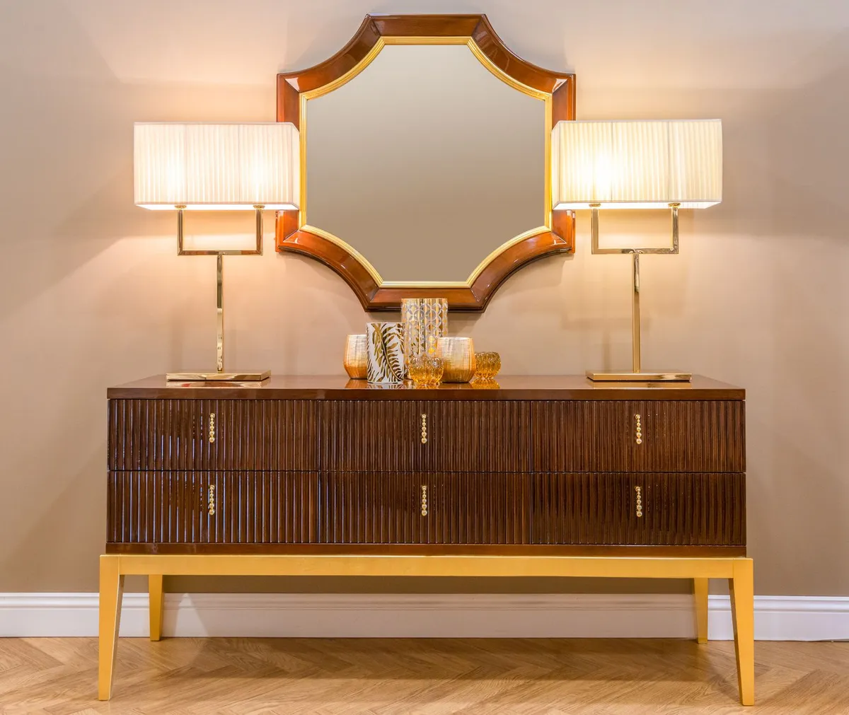 Art Deco dining room with geometric ceiling medallion gold light fixture and marble table