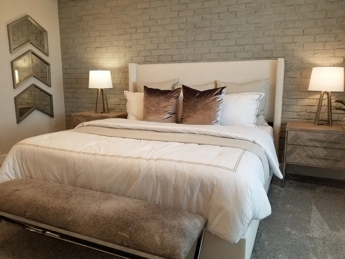Professionally staged living room with neutral palette and curated furniture arrangement