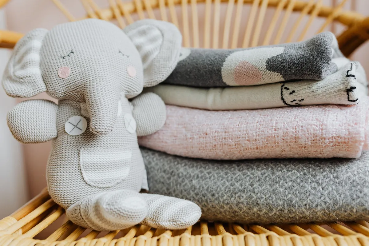 Modern nursery with clean lines, neutral palette, and convertible crib