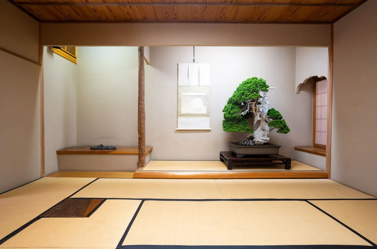 Natural material textures in a zen interior featuring stone, linen, unfinished wood and ceramic objects