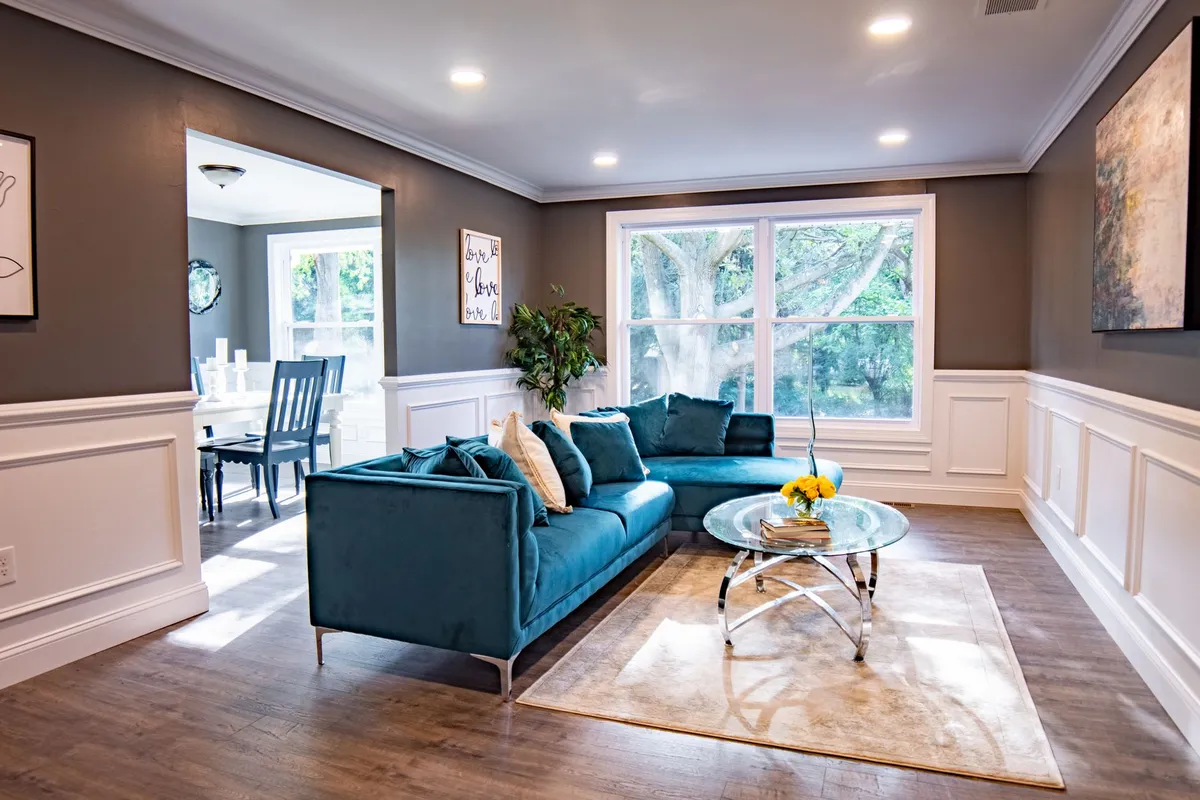 Living room with floating furniture arrangement around central area rug